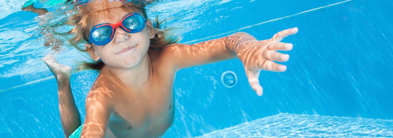 photo of children learning to swim